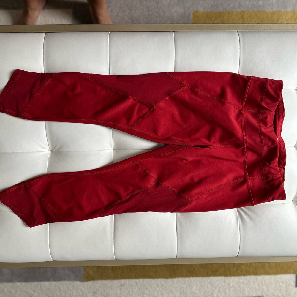 Athleta red 3/4 length leggings with mesh detail. Size small. Medium rise.